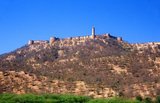 Jaigarh Fort, also known as Victory Fort, is situated on the promontory called the Cheel ka Teela (Hill of Eagles) of the Aravalli range; it overlooks the Amber Fort and the Maota Lake. The fort was built by Jai Singh II in 1726 to protect the Amber Fort and its palace.<br/><br/>

Jaipur is the capital and largest city of the Indian state of Rajasthan. It was founded on 18 November 1727 by Maharaja Sawai Jai Singh II, the ruler of Amber, after whom the city was named. The city today has a population of 3.1 million. Jaipur is known as the Pink City of India.<br/><br/>

The city is remarkable among pre-modern Indian cities for the width and regularity of its streets which are laid out into six sectors separated by broad streets 34 m (111 ft) wide. The urban quarters are further divided by networks of gridded streets. Five quarters wrap around the east, south, and west sides of a central palace quarter, with a sixth quarter immediately to the east. The Palace quarter encloses the sprawling Hawa Mahal palace complex, formal gardens, and a small lake. Nahargarh Fort, which was the residence of the King Sawai Jai Singh II, crowns the hill in the northwest corner of the old city. The observatory, Jantar Mantar, is a World Heritage Site.